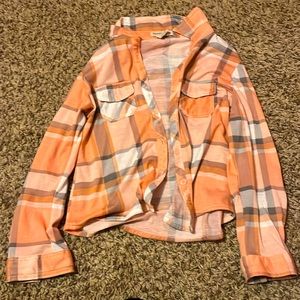 I’m selling a plaid pink jacket from passport size 6X for girls.
